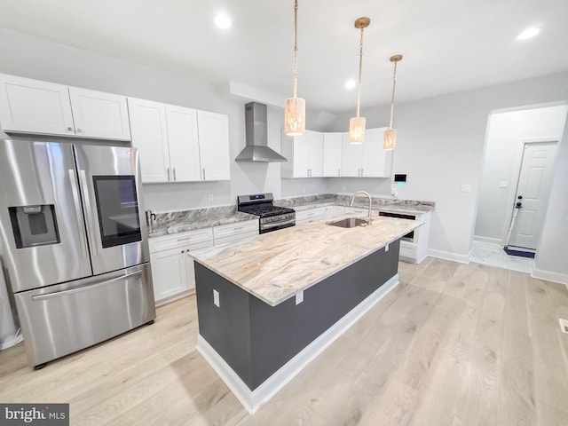 3906 Reisterstown Rd, Baltimore, MD 21215 - kitchen featuring appliances with stainless steel finishes, wall chimney exhaust hood, a sink, white cabinets, and recessed lighting