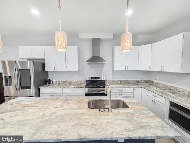 3906 Reisterstown Rd, Baltimore, MD 21215 - kitchen with wall chimney range hood, stainless steel appliances, a sink, and light stone counters