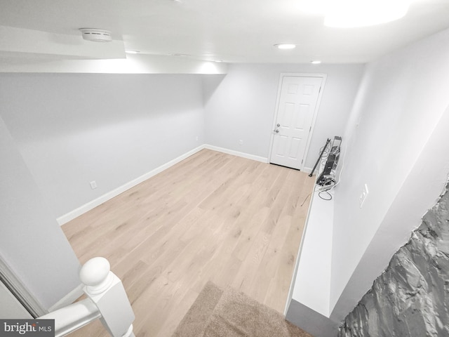 3906 Reisterstown Rd, Baltimore, MD 21215 - finished below grade area featuring light wood-type flooring, baseboards, and recessed lighting