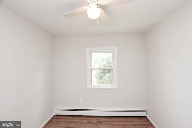 19468 Youngs Cliff Rd, Sterling, VA 20165 - unfurnished room with wood finished floors, a baseboard heating unit, and baseboards
