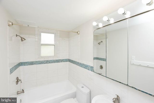 19468 Youngs Cliff Rd, Sterling, VA 20165 - bathroom featuring  shower combination, toilet, and tile walls