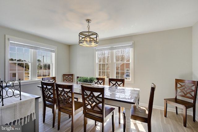 20938 Olen Mattingly Rd, Avenue, MD 20609 - dining space featuring baseboards, wood finished floors, and a notable chandelier