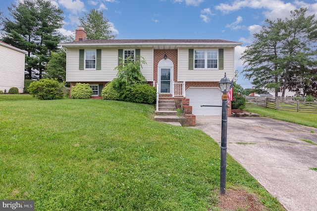 2943 Strathaven Ln, Abingdon, MD 21009 - bi-level home with concrete driveway, a chimney, a garage, and brick siding