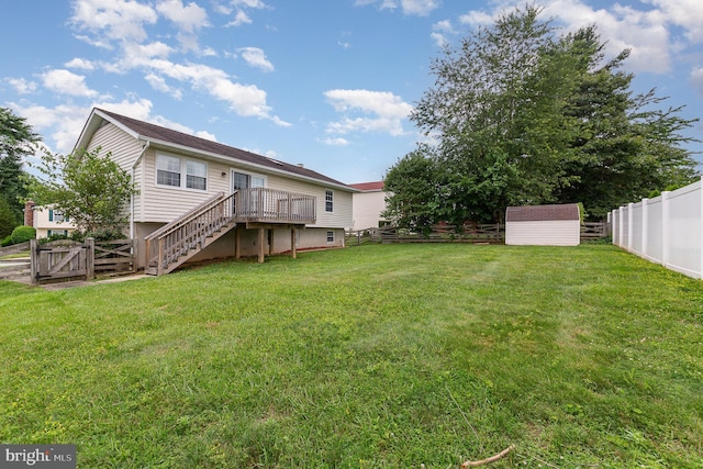 2943 Strathaven Ln, Abingdon, MD 21009 - rear view of property with stairway, a fenced backyard, a wooden deck, a storage unit, and a gate