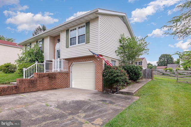 2943 Strathaven Ln, Abingdon, MD 21009 - bi-level home with an attached garage, brick siding, and driveway