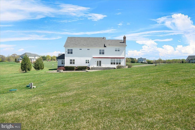 15841 Seneca Run Ct, Darnestown, MD 20874 - rear view of house featuring a chimney, a yard, and a patio