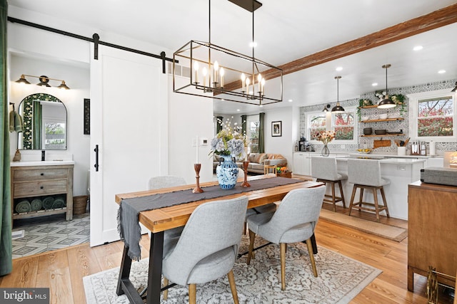 307 Kendall Blvd, Oaklyn, NJ 08107 - dining room featuring recessed lighting, a barn door, a notable chandelier, and light wood-type flooring