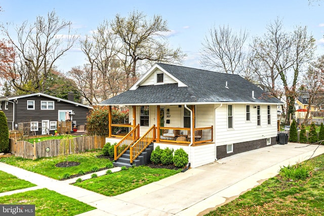 307 Kendall Blvd, Oaklyn, NJ 08107 - bungalow-style house with a front lawn, a shingled roof, covered porch, and driveway