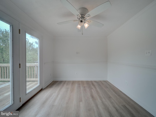 1566 Lodge Pole Ct, Annapolis, MD 21409 - spare room with a ceiling fan, baseboards, ornamental molding, and light wood-style floors