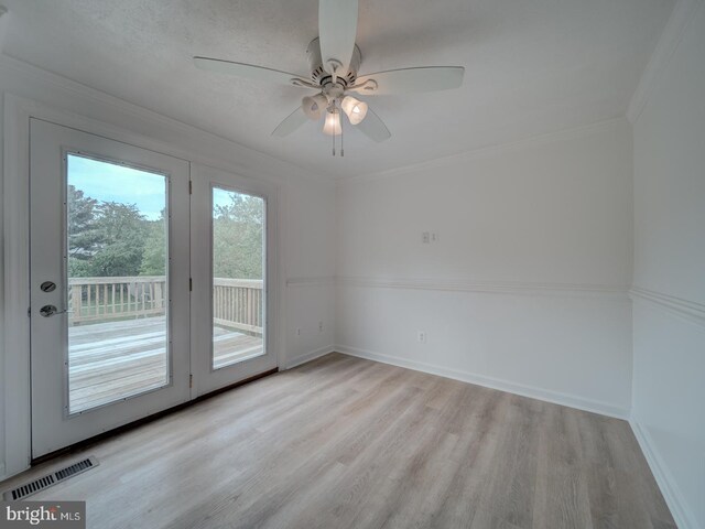 1566 Lodge Pole Ct, Annapolis, MD 21409 - empty room featuring ceiling fan, visible vents, wood finished floors, baseboards, and ornamental molding