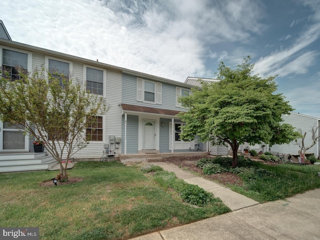 1566 Lodge Pole Ct, Annapolis, MD 21409 - townhome / multi-family property with a front lawn