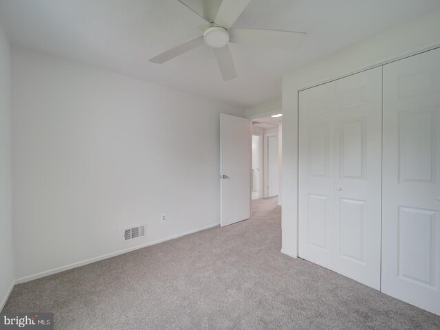 1566 Lodge Pole Ct, Annapolis, MD 21409 - unfurnished bedroom with ceiling fan, carpet floors, baseboards, visible vents, and a closet