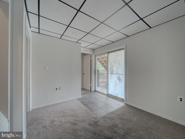 1566 Lodge Pole Ct, Annapolis, MD 21409 - unfurnished room with baseboards, carpet flooring, and a paneled ceiling