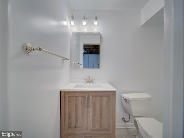 1566 Lodge Pole Ct, Annapolis, MD 21409 - bathroom with baseboards, tile patterned flooring, vanity, and toilet