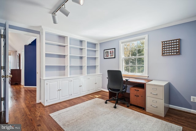 office area with rail lighting, baseboards, ornamental molding, and dark wood finished floors