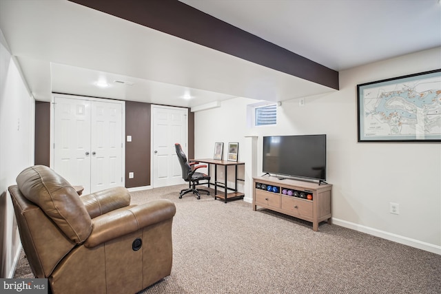 living room with visible vents, baseboards, and carpet