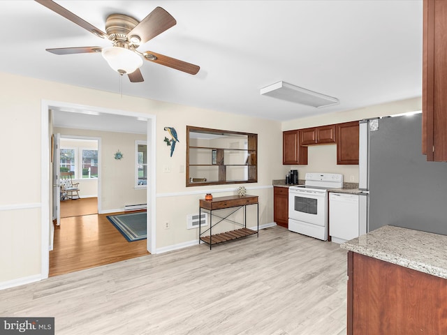 kitchen with ceiling fan, light wood-type flooring, white appliances, baseboard heating, and light stone countertops