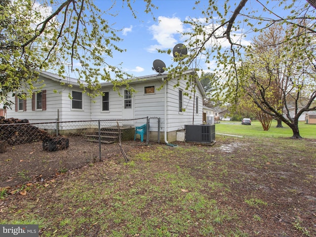 view of side of home featuring cooling unit