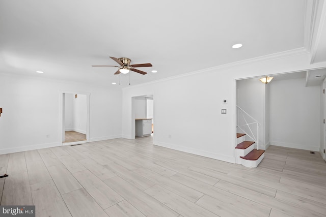 unfurnished living room with crown molding, ceiling fan, recessed lighting, and stairs
