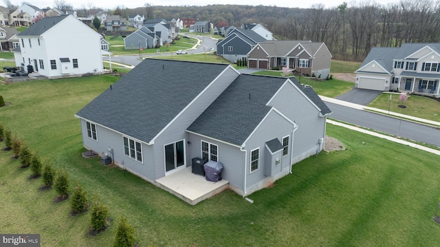 birds eye view of property featuring a residential view