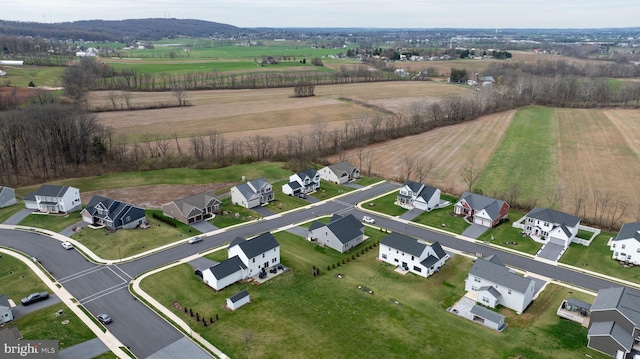 aerial view featuring a rural view and a residential view