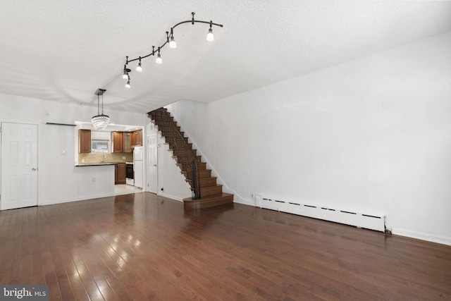 2225 S Hicks St, Philadelphia, PA 19145 - unfurnished living room featuring stairway, hardwood / wood-style floors, baseboards, a textured ceiling, and a baseboard radiator
