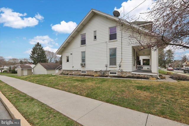 1402 Elm St, Lebanon, PA 17042 - view of property exterior with a yard and a porch