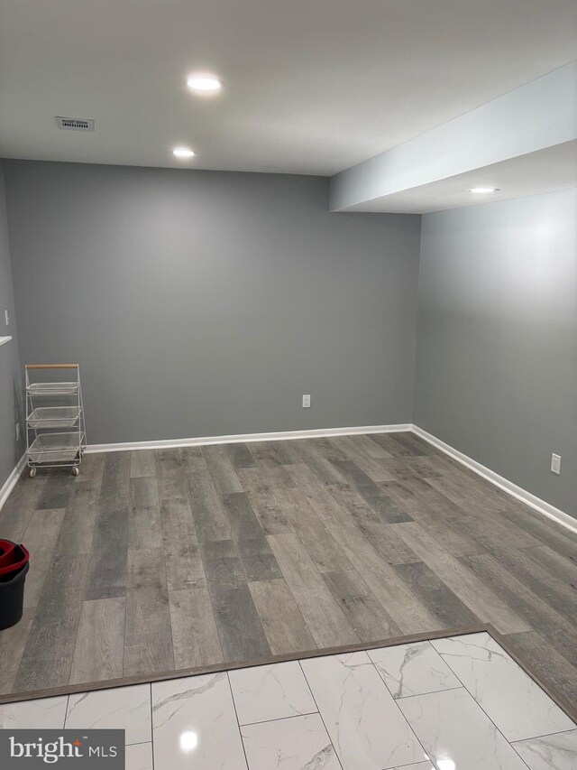 354 Kemper Dr, Newark, DE 19702 - finished basement featuring recessed lighting, baseboards, and dark marble finish floors