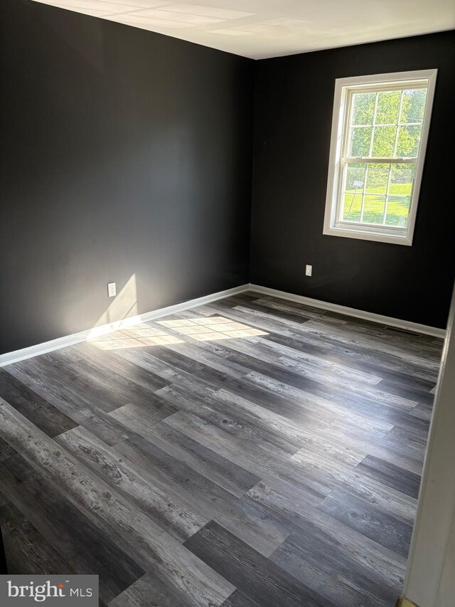 354 Kemper Dr, Newark, DE 19702 - empty room with wood finished floors and baseboards