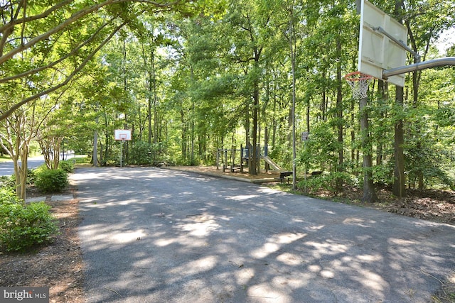 1260 Swanhill, Curtis Bay, MD 21226 - view of basketball court with basketball hoop and a playground
