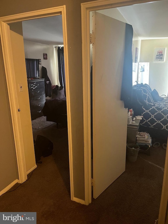 corridor with carpet floors