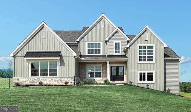 1999 N Fall Harvest Dr, Mechanicsburg, PA 17055 - modern inspired farmhouse featuring a front yard, metal roof, board and batten siding, a standing seam roof, and roof with shingles