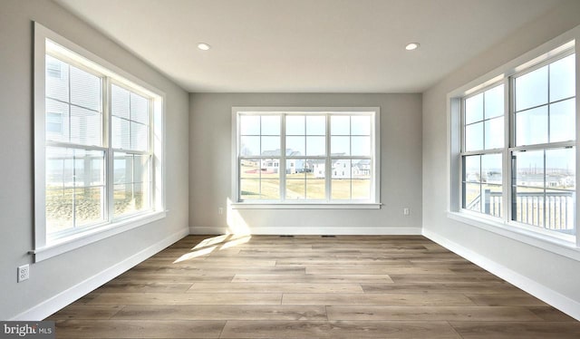 1999 N Fall Harvest Dr, Mechanicsburg, PA 17055 - empty room featuring baseboards, recessed lighting, and wood finished floors