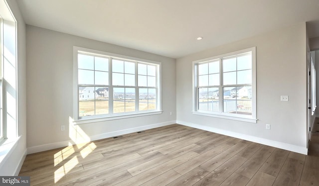 1999 N Fall Harvest Dr, Mechanicsburg, PA 17055 - unfurnished room featuring recessed lighting, baseboards, and wood finished floors