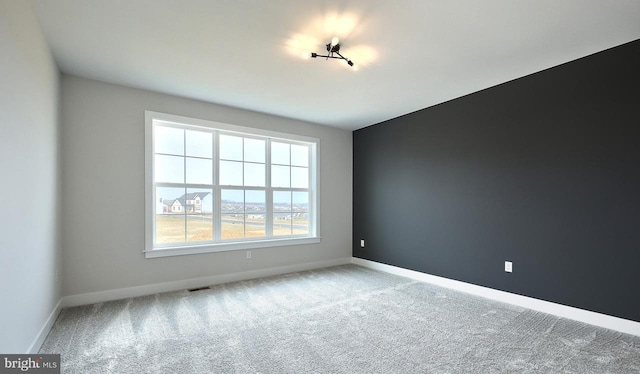 1999 N Fall Harvest Dr, Mechanicsburg, PA 17055 - spare room featuring visible vents, baseboards, and carpet floors