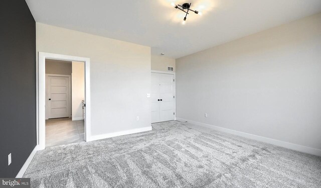 1999 N Fall Harvest Dr, Mechanicsburg, PA 17055 - unfurnished bedroom featuring visible vents, baseboards, and carpet