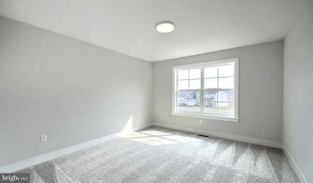 1999 N Fall Harvest Dr, Mechanicsburg, PA 17055 - carpeted spare room featuring baseboards and visible vents