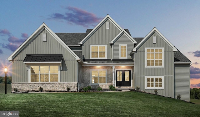 1999 N Fall Harvest Dr, Mechanicsburg, PA 17055 - view of front of property with roof with shingles, french doors, board and batten siding, stone siding, and a front yard