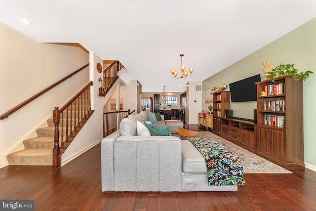 8473 Randell Ridge Rd, Frederick, MD 21704 - living area with wood finished floors, stairway, a chandelier, baseboards, and vaulted ceiling