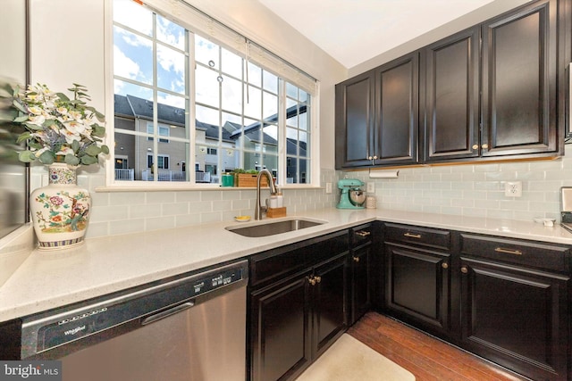 8473 Randell Ridge Rd, Frederick, MD 21704 - kitchen with stainless steel dishwasher, a sink, tasteful backsplash, wood finished floors, and light countertops