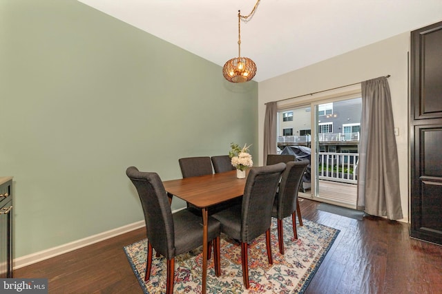 8473 Randell Ridge Rd, Frederick, MD 21704 - dining room featuring dark wood finished floors, baseboards, and a chandelier