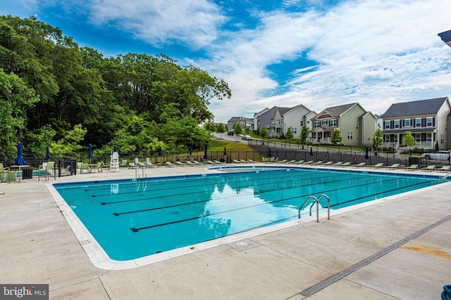 8473 Randell Ridge Rd, Frederick, MD 21704 - community pool featuring a residential view and a patio
