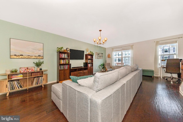 8473 Randell Ridge Rd, Frederick, MD 21704 - living area featuring a chandelier, dark wood-style flooring, lofted ceiling, and baseboards
