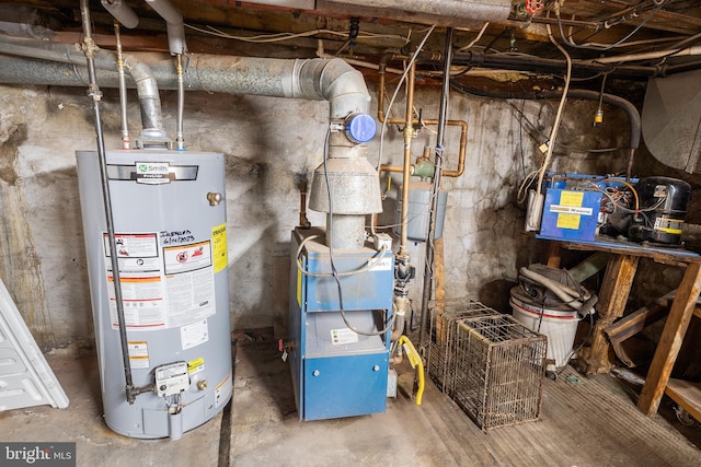 utility room featuring water heater