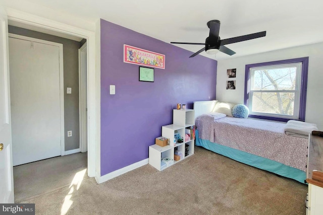 bedroom featuring carpet flooring, baseboards, and ceiling fan