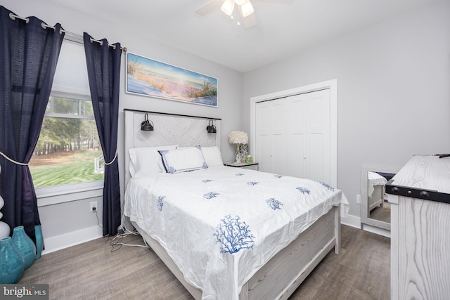 13115 Muirfield Ln, Berlin, MD 21811 - bedroom featuring a ceiling fan, wood finished floors, baseboards, and a closet