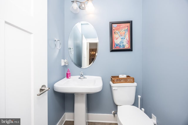 13115 Muirfield Ln, Berlin, MD 21811 - bathroom featuring toilet and baseboards