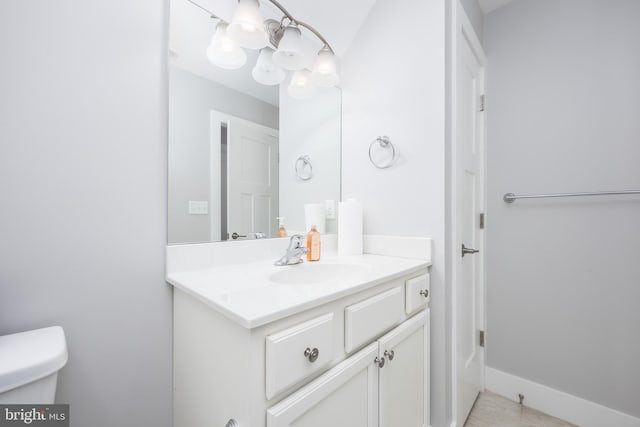 13115 Muirfield Ln, Berlin, MD 21811 - half bathroom with toilet, vanity, a notable chandelier, and baseboards