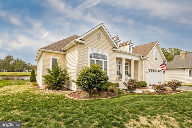 13115 Muirfield Ln, Berlin, MD 21811 - view of front of property with a garage, a shingled roof, and a front lawn