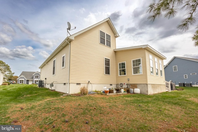 13115 Muirfield Ln, Berlin, MD 21811 - back of property with a yard and central air condition unit